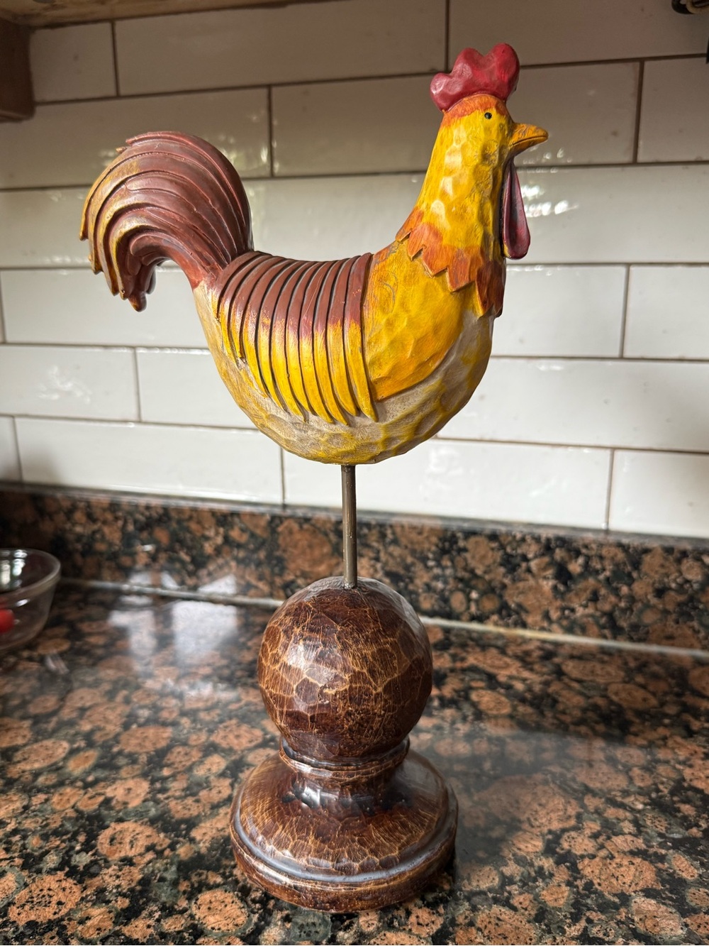 Folk art wood-carved rooster figurine on mount 13” tall.